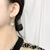 Picture of Delicate Artificial Pearl Dangle Earrings at Unbeatable Price